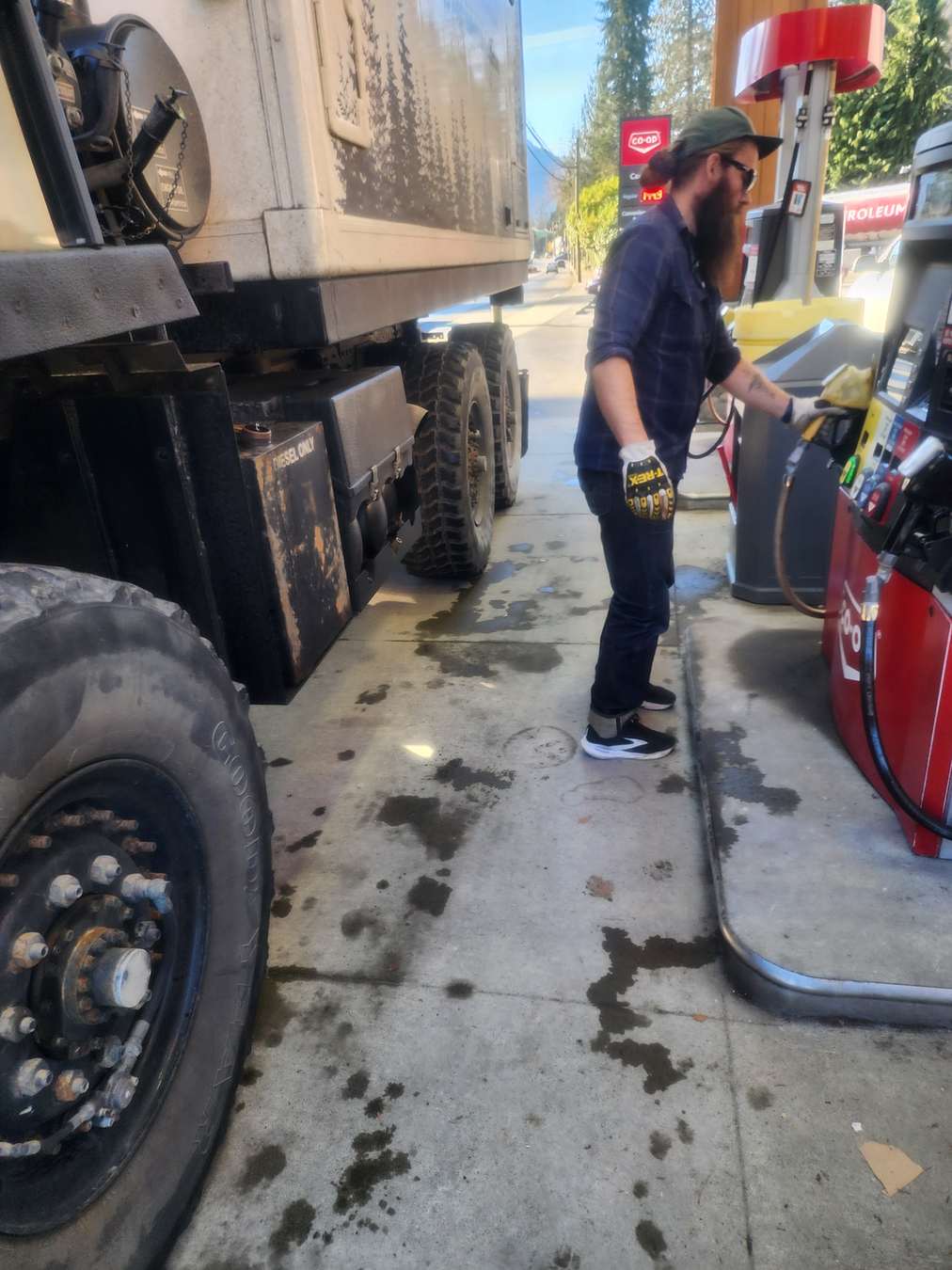 Fuelling a 6x6 expedition truck at a highway fuel stop