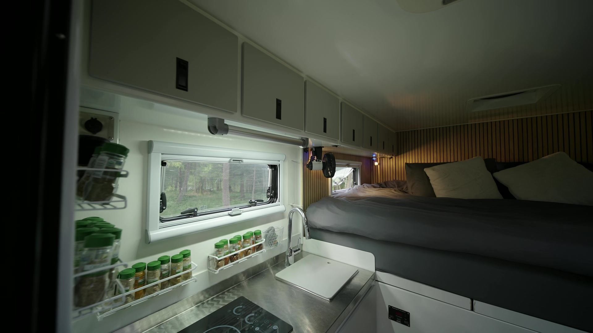 Roxanne's spice rack and galley sink under the long window over the counter